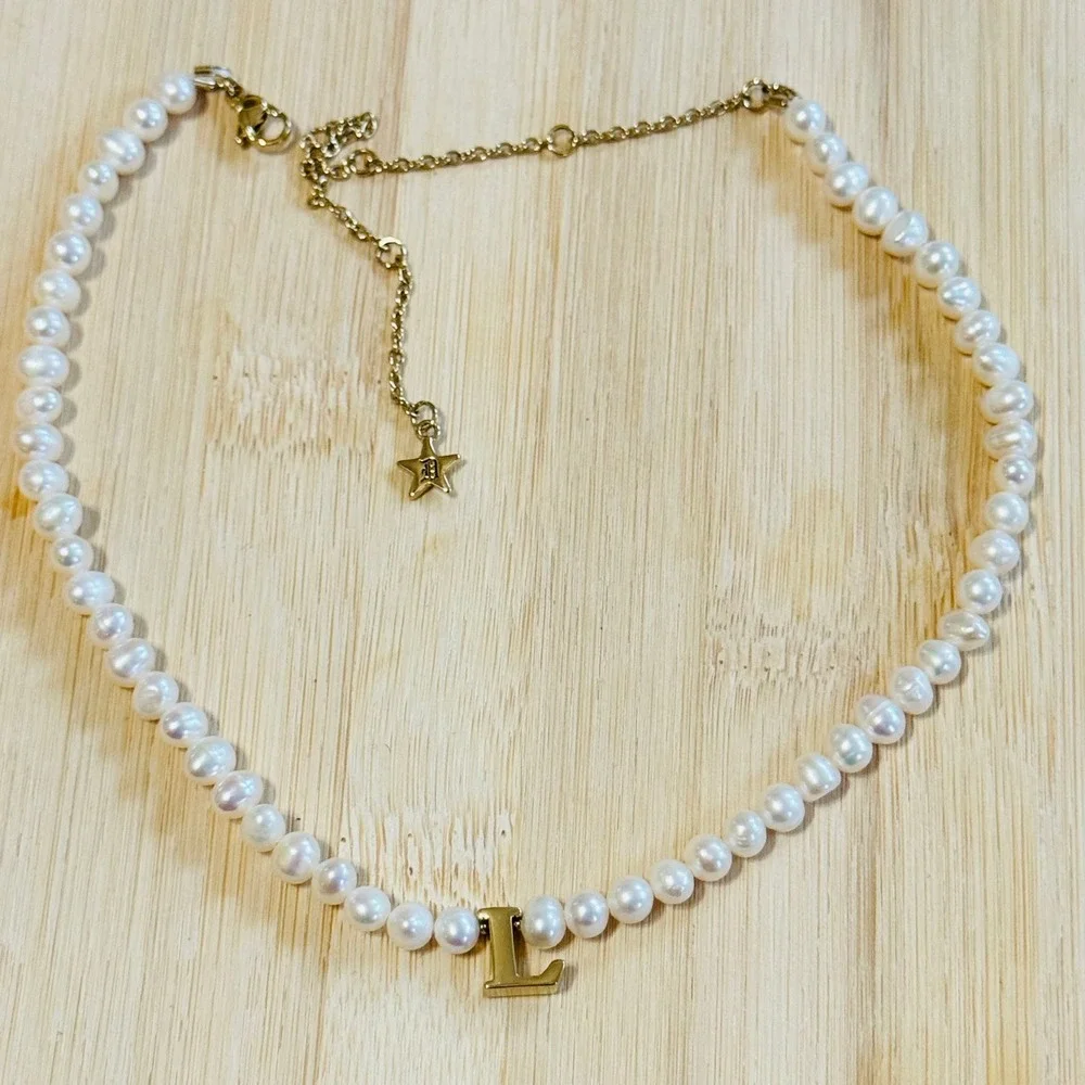 Dalmata Initial letter 